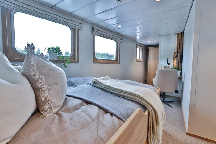 MV Vikingfjord Cabin 8 Mid with Bed Detail Secret Atlas.jpg